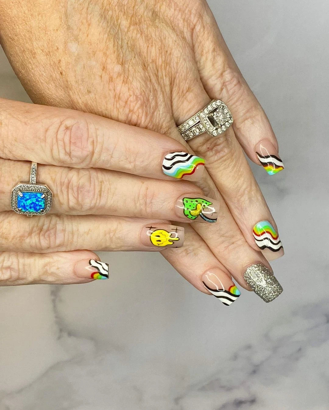 300 Piece Combo of Raver / Festival Themed Nail Decal patterns.  Everything you need in one place.